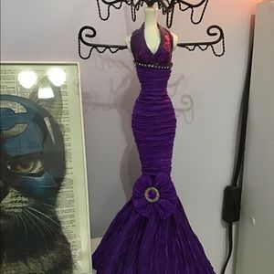 A dress-shaped jewelry holder